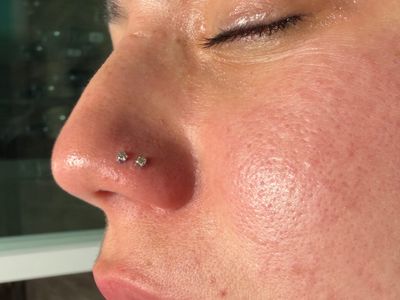 Double Nostril piercing with Implant Grade Titanium Threadless by NeoMetal by Mingo at Platinum Tattoos & Piercings, San Antonio TX