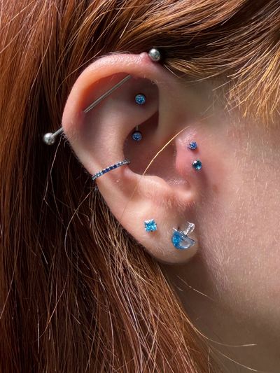 Tragus piercing with Implant Grade Titanium Labret Stud/Flat Back by NeoMetal by Mingo at Platinum Tattoos & Piercings, San Antonio TX