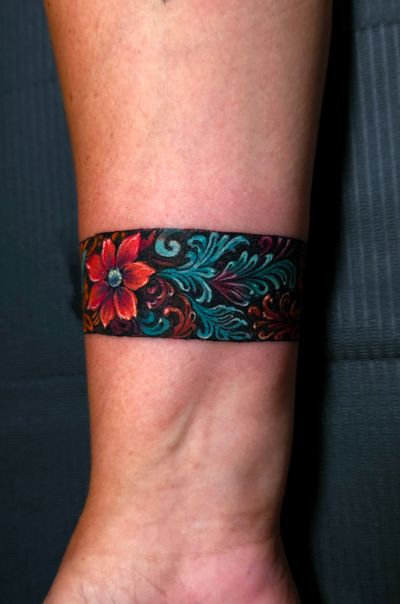 Color tattoo on the Hand by Lee at Platinum Tattoos & Piercings, San Antonio TX