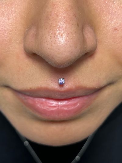 Medusa piercing with Threadless by NeoMetal by Harley at Platinum Tattoos & Piercings, San Antonio TX