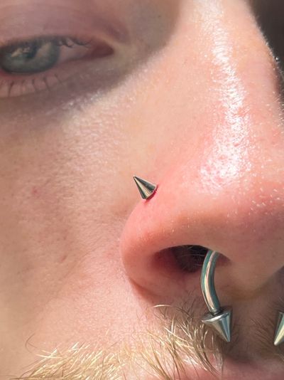 Nostril piercing with Implant Grade Titanium Threadless by NeoMetal by Harley at Platinum Tattoos & Piercings, San Antonio TX