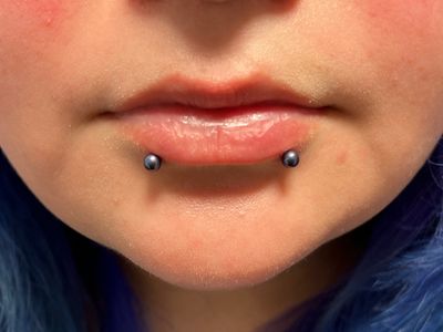 Snake Bites piercing with Threadless by NeoMetal by Harley at Platinum Tattoos & Piercings, San Antonio TX