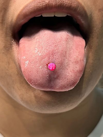 Tongue piercing with Implant Grade Titanium Barbell by NeoMetal by Harley at Platinum Tattoos & Piercings, San Antonio TX