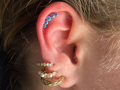 1st Helix piercing with Implant Grade Titanium Cluster/Multi-Gem by NeoMetal by Mingo at Platinum Tattoos & Piercings, San Antonio TX