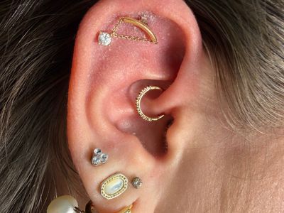 Daith piercing with 14k Yellow Gold Cluster/Multi-Gem by Tawapa by Mingo at Platinum Tattoos & Piercings, San Antonio TX