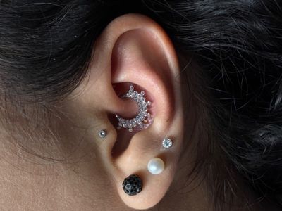 Daith piercing with Implant Grade Titanium Cluster/Multi-Gem by Tawapa by Mingo at Platinum Tattoos & Piercings, San Antonio TX