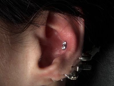 Conch piercing with Implant Grade Titanium Cluster/Multi-Gem by Other by Mingo at Platinum Tattoos & Piercings, San Antonio TX