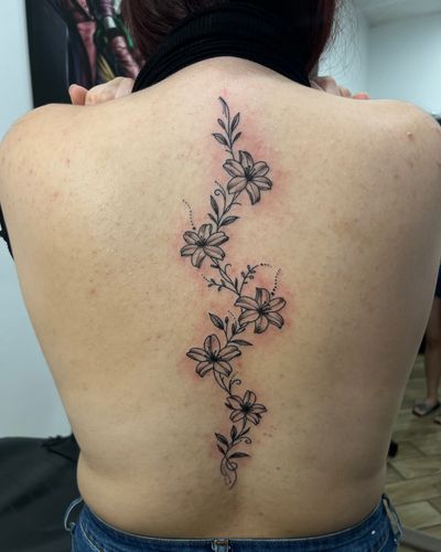 Black & Grey, Floral, Linework Black Flower tattoo by Jesus at Platinum Tattoos & Piercings, San Antonio TX