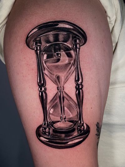 Black & Grey, Realism Black Clock tattoo on the Upper Arm by Remy at Platinum Tattoos & Piercings, San Antonio TX