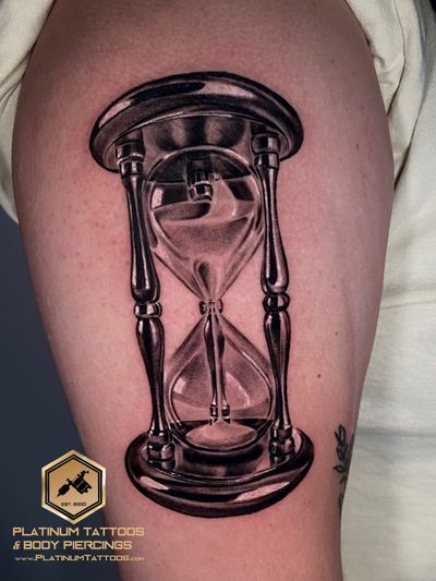 Black & Grey, Realism Black Clock tattoo on the Upper Arm by Remy at Platinum Tattoos & Piercings, San Antonio TX