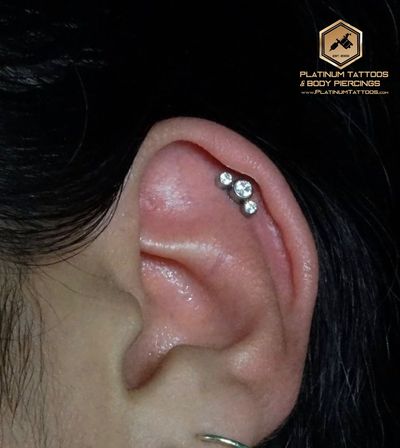 1st Helix piercing with Implant Grade Titanium Cluster/Multi-Gem by NeoMetal by Mingo at Platinum Tattoos & Piercings, San Antonio TX