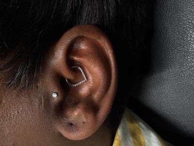 Daith piercing with Implant Grade Titanium Cluster/Multi-Gem by Other by Mingo at Platinum Tattoos & Piercings, San Antonio TX