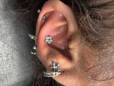 Conch piercing with Implant Grade Titanium Cluster/Multi-Gem by NeoMetal by Mingo at Platinum Tattoos & Piercings, San Antonio TX