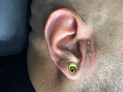Surface piercing with Implant Grade Titanium Surface Jewelry by Other by Mingo at Platinum Tattoos & Piercings, San Antonio TX