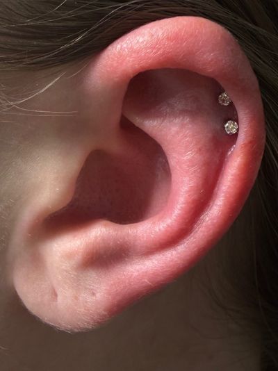 Curated ear piercing setup — 1st Helix, 2nd Helix with Implant Grade Titanium Labret Stud/Flat Back by NeoMetal by Mingo at Platinum Tattoos & Piercings, San Antonio TX