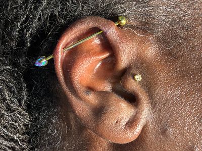 Industrial piercing with Implant Grade Titanium Barbell by Industrial Strength by Mingo at Platinum Tattoos & Body Piercings, San Antonio TX
